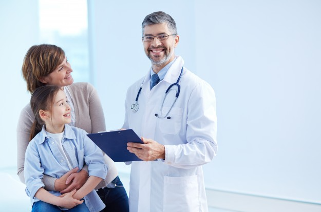 Doctor with parent and child