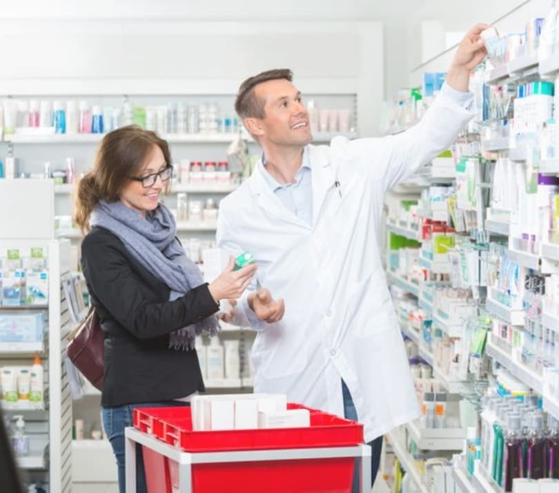 Pharmacy Image - patient checking medicines with pharmacist